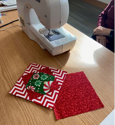 Sewing mug rugs at the libraries